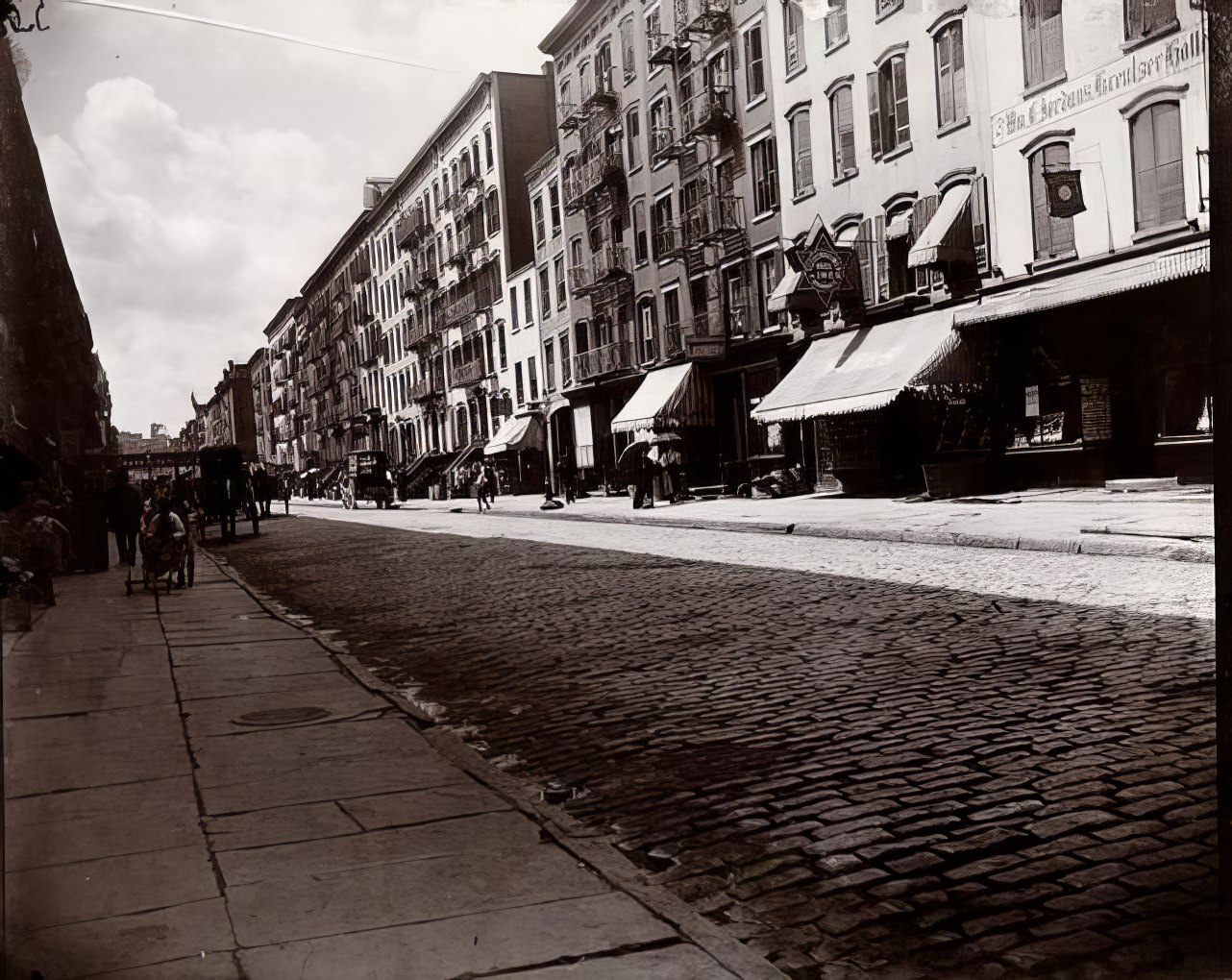 The same street before Colonel Waring's street cleaning reforms, 1894.