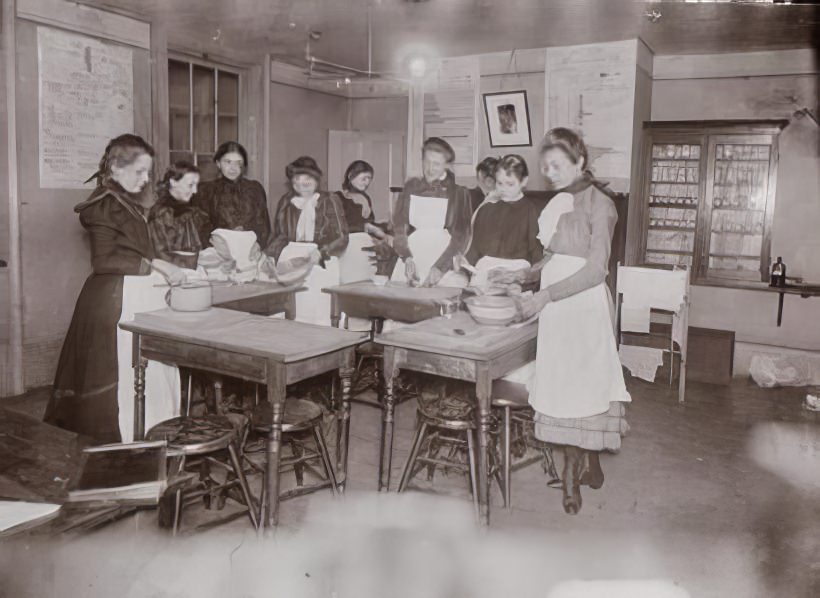 A cooking school class in a college settlement, 1895.