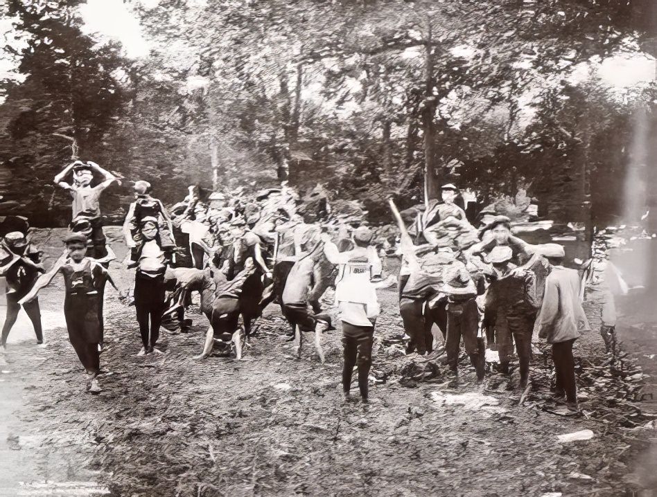 Children playing in a vacation playground near Old Frog Hollow, 1894.