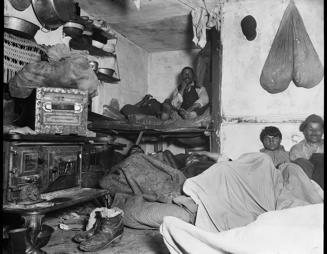 Lodgers in a crowded Bayard Street tenement, 1890s.