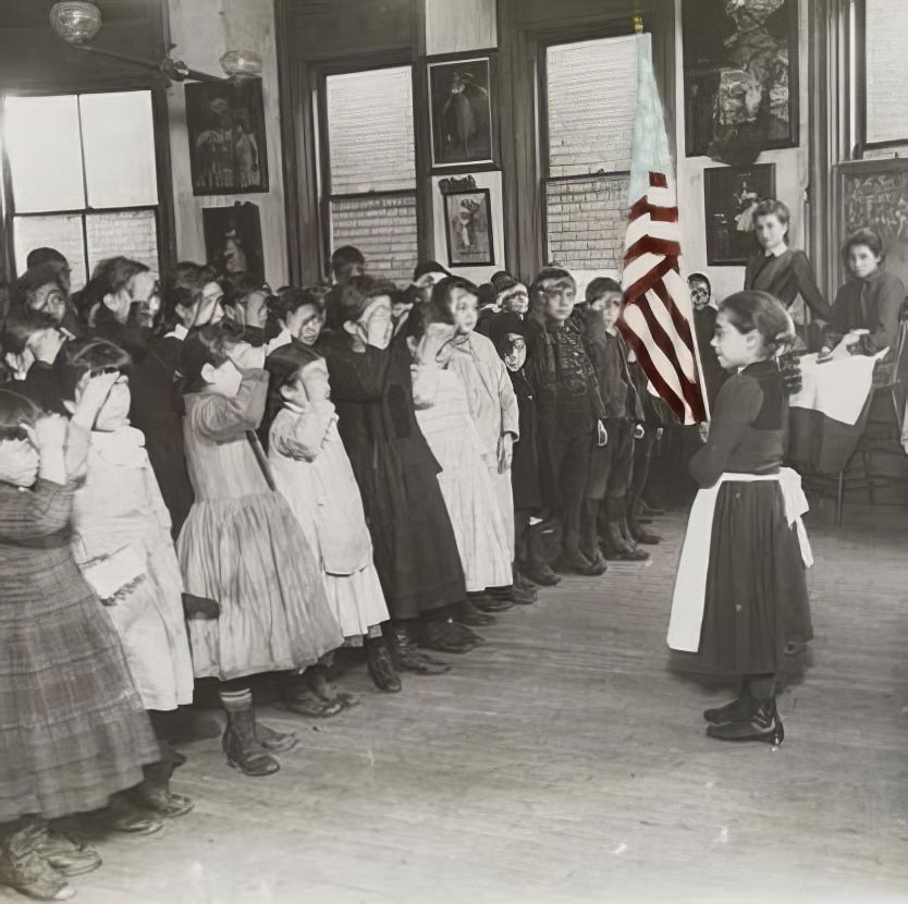 Saluting the flag at the Mott Street Industrial School, 1890s.