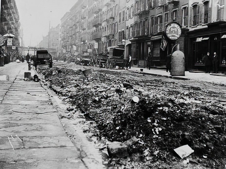 An East Side street before Colonel Waring's cleaning, 1895.