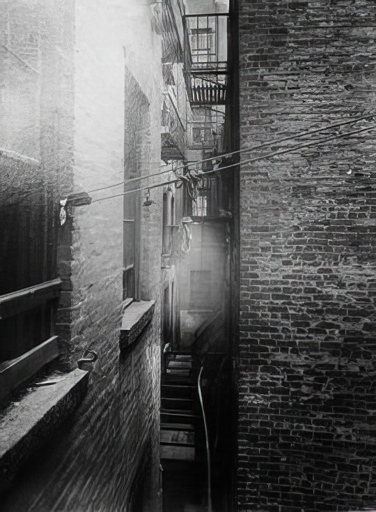 36-36 1/2 Baxter Street before tenement demolition, 1900s.