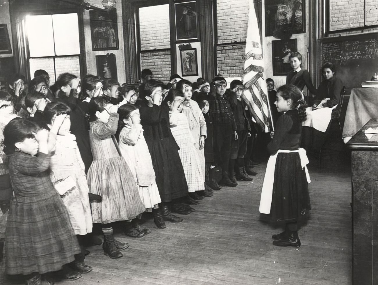 Saluting the flag at the Mott Street Industrial School, 1890s.