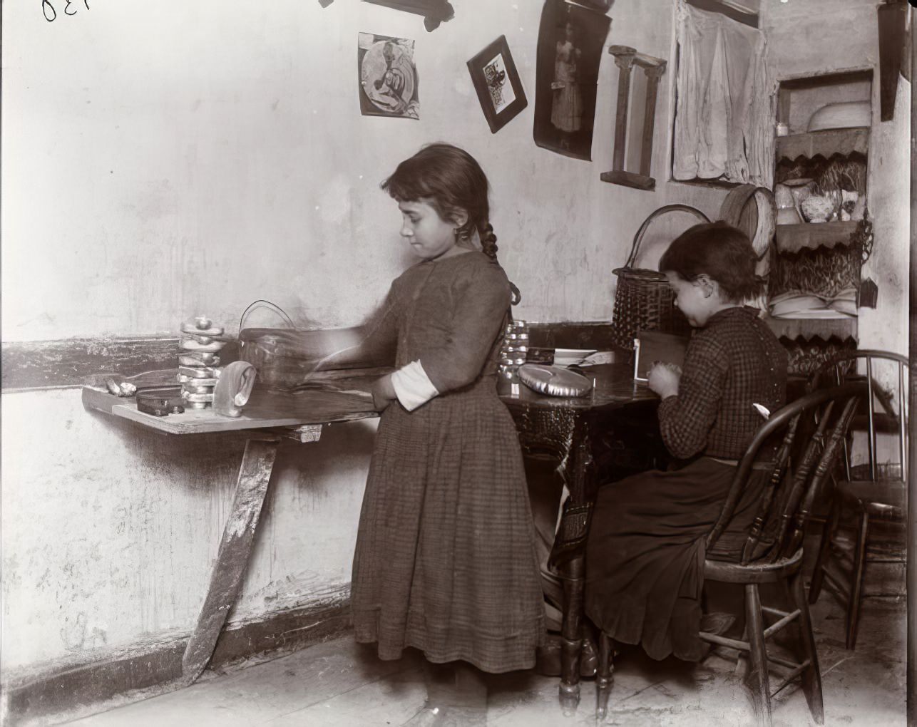 "Little Susie at her work," Gotham Court, 1890s.