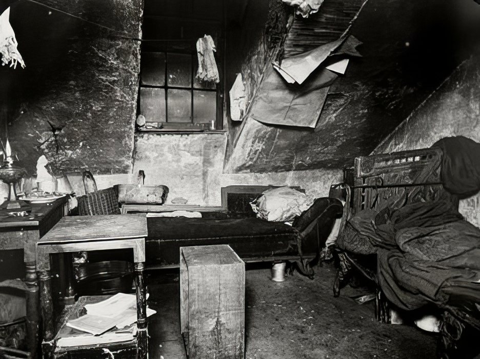 Cluttered room in attic, circa 1895.