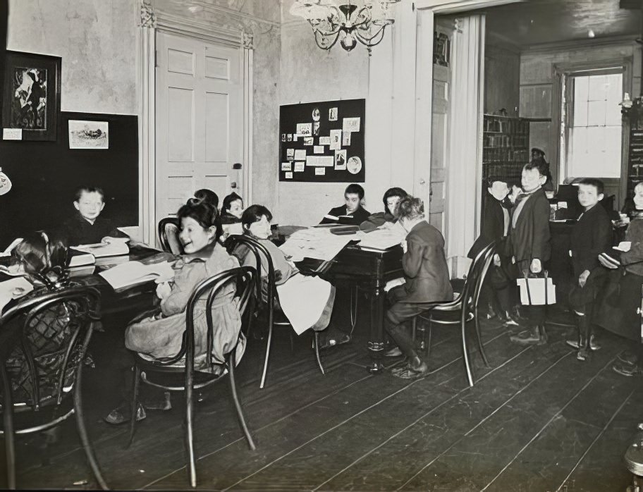 "Getting Books" at 48 Henry Street, circa 1900.