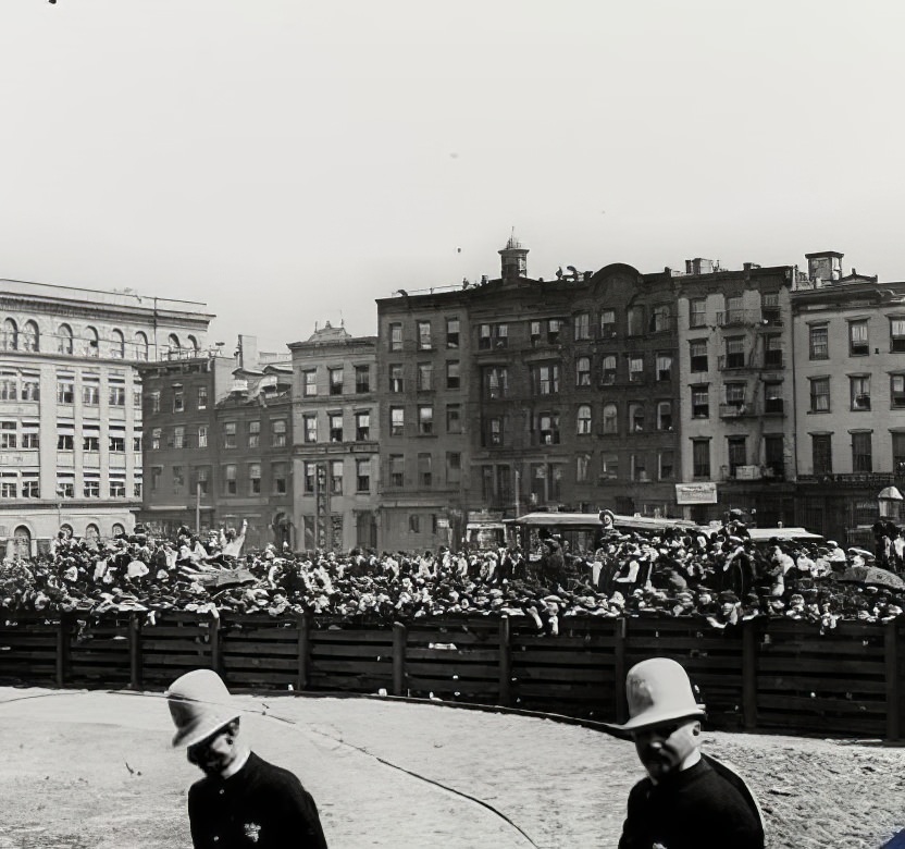 Crowd at opening of a small park, circa 1900.