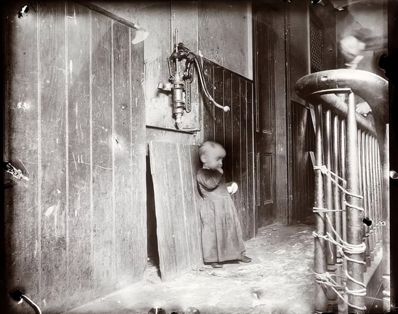 A baby's playground in a slum tenement, 1890s.