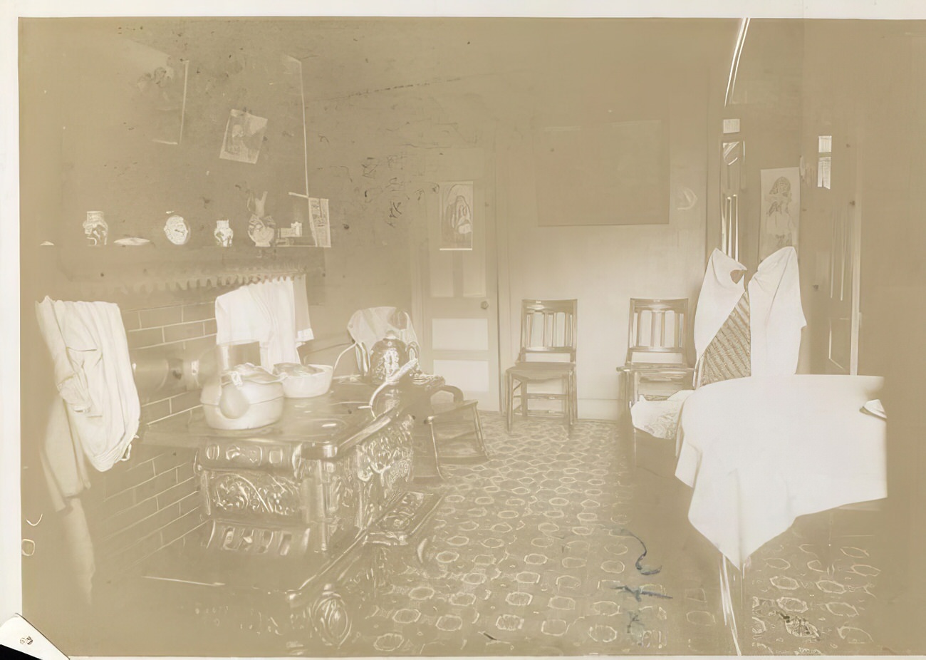 Kitchen in Mr. White's Riverside Tenements, Brooklyn, circa 1900.