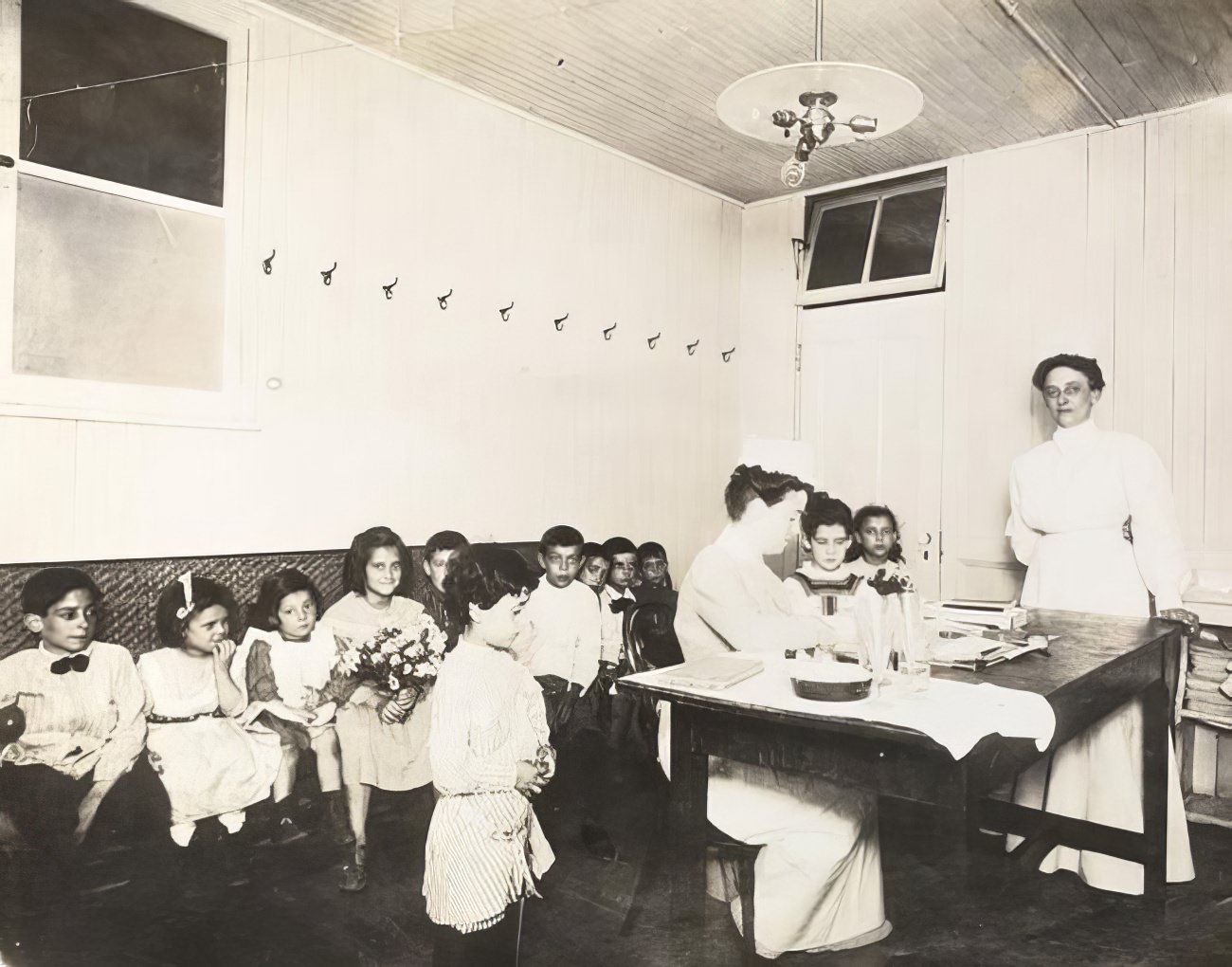 Children in the nurse's room, circa 1900.