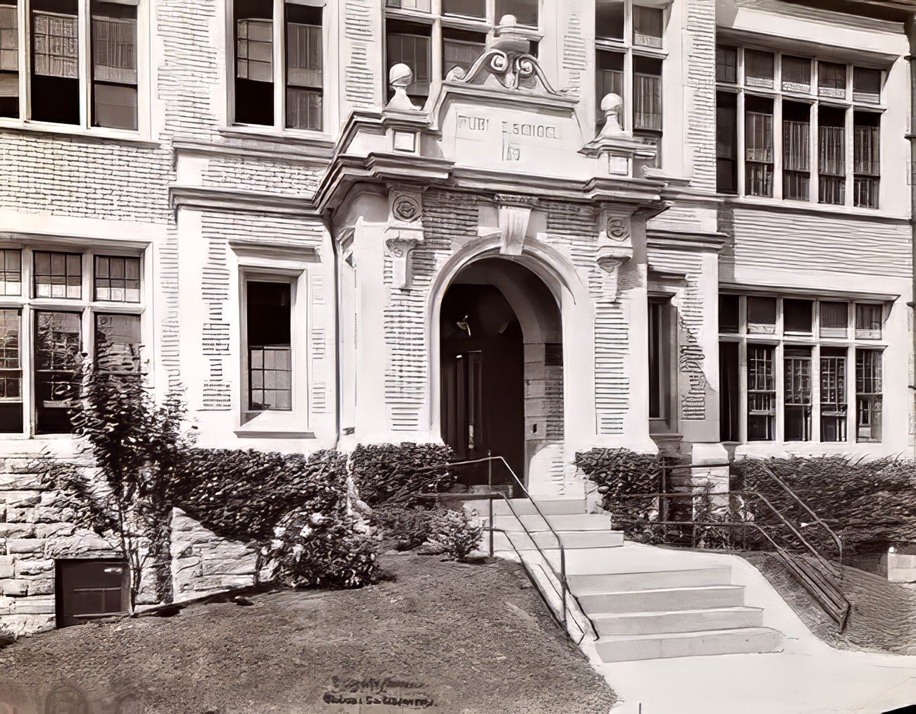 Main entrance of Public School 153, Bronx, 1900s.