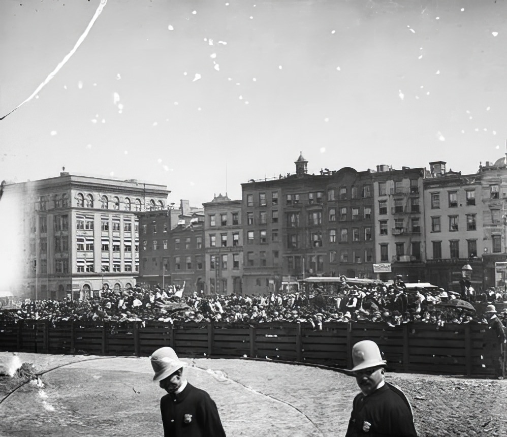 Crowd at opening of a small park, circa 1900.