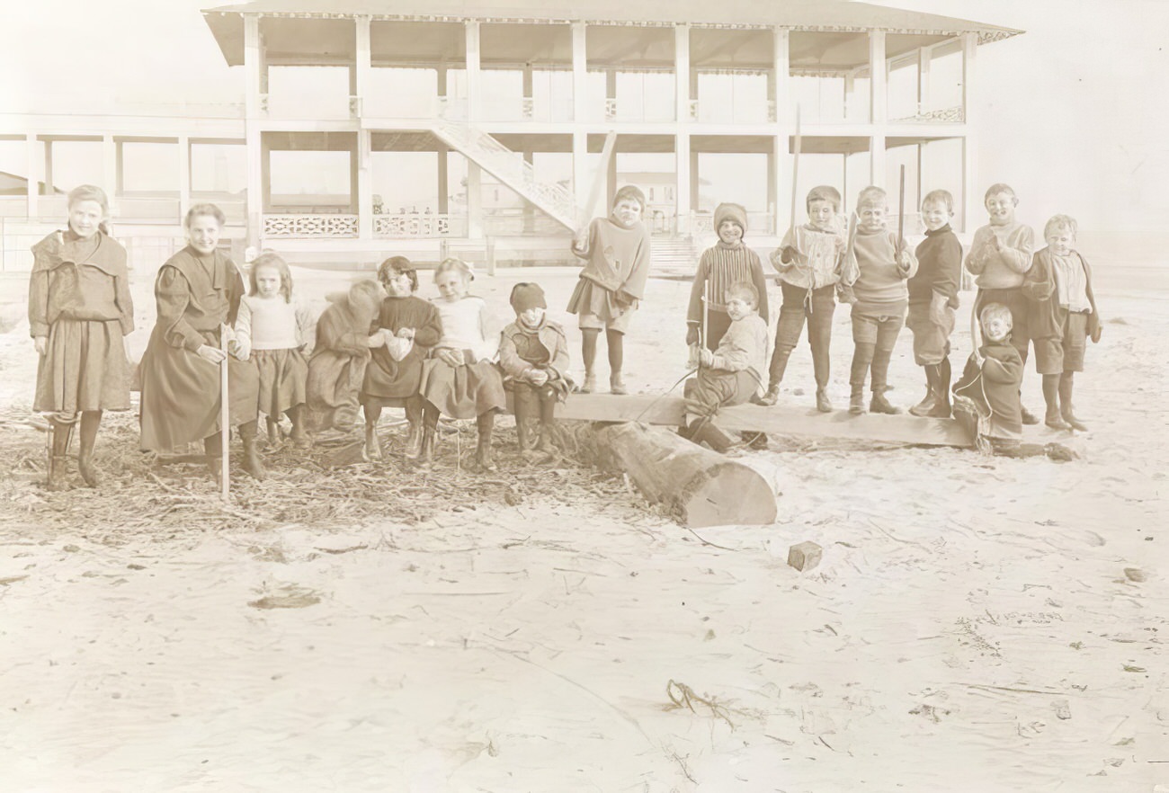 Little cripples on the beach at Sea Breeze, circa 1895.