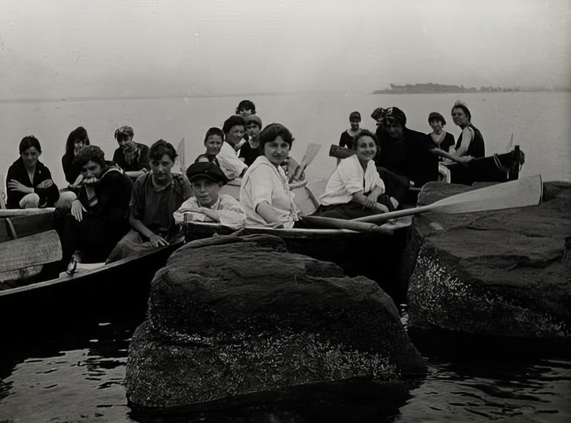 Young people in rowboats, 1914.