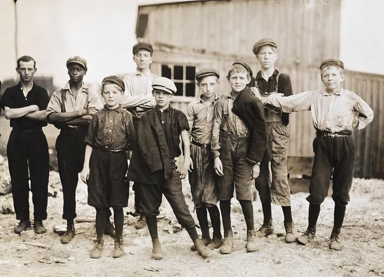 Boys working the night shift at a Virginia glass factory, 1911.