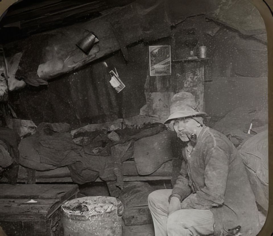 An Italian home under a dump, 1890s.