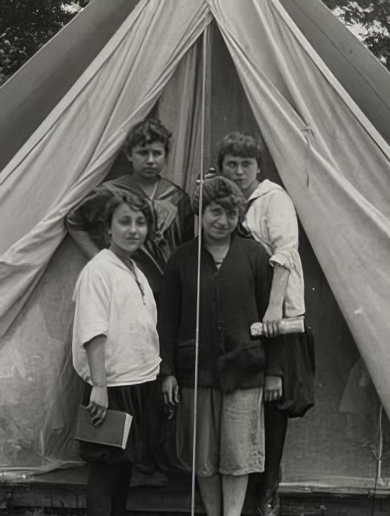 Four girls at a summer camp, 1900.