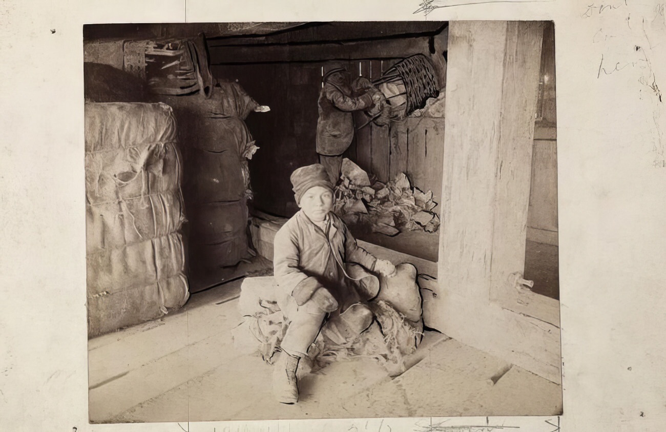 A child living near a dump, 1900.