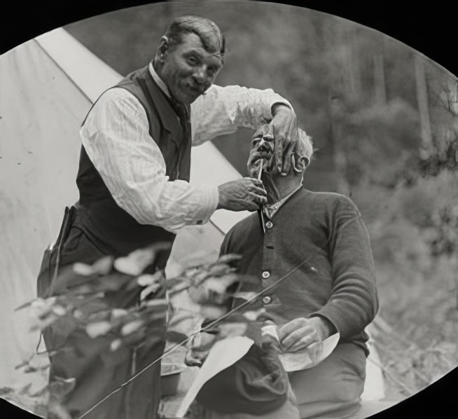 An old man getting a shave, 1914.