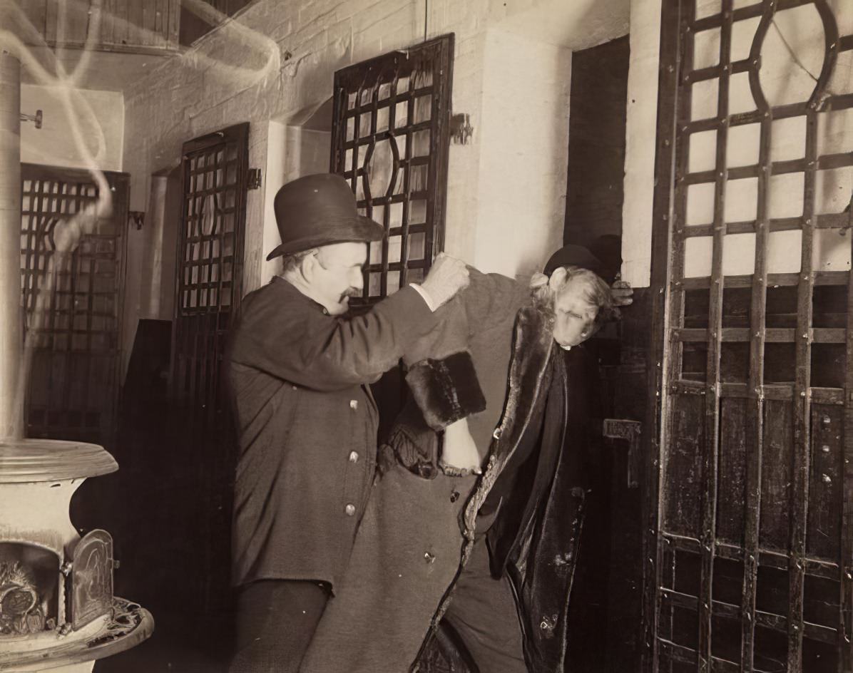 A well-dressed man being jailed, 1895.