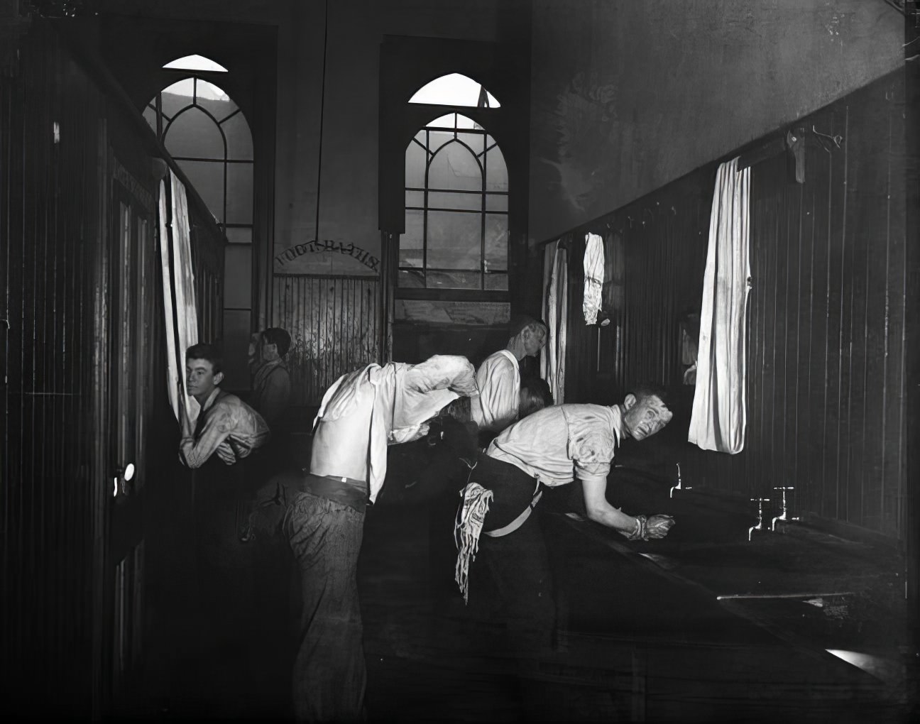 Newsboys washing up, 1890s.