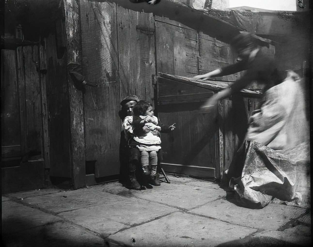 A baby in Gotham Court, 1890s.