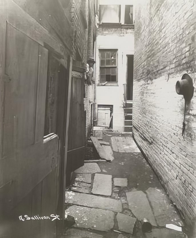 A back alley on Sullivan Street, 1890s.