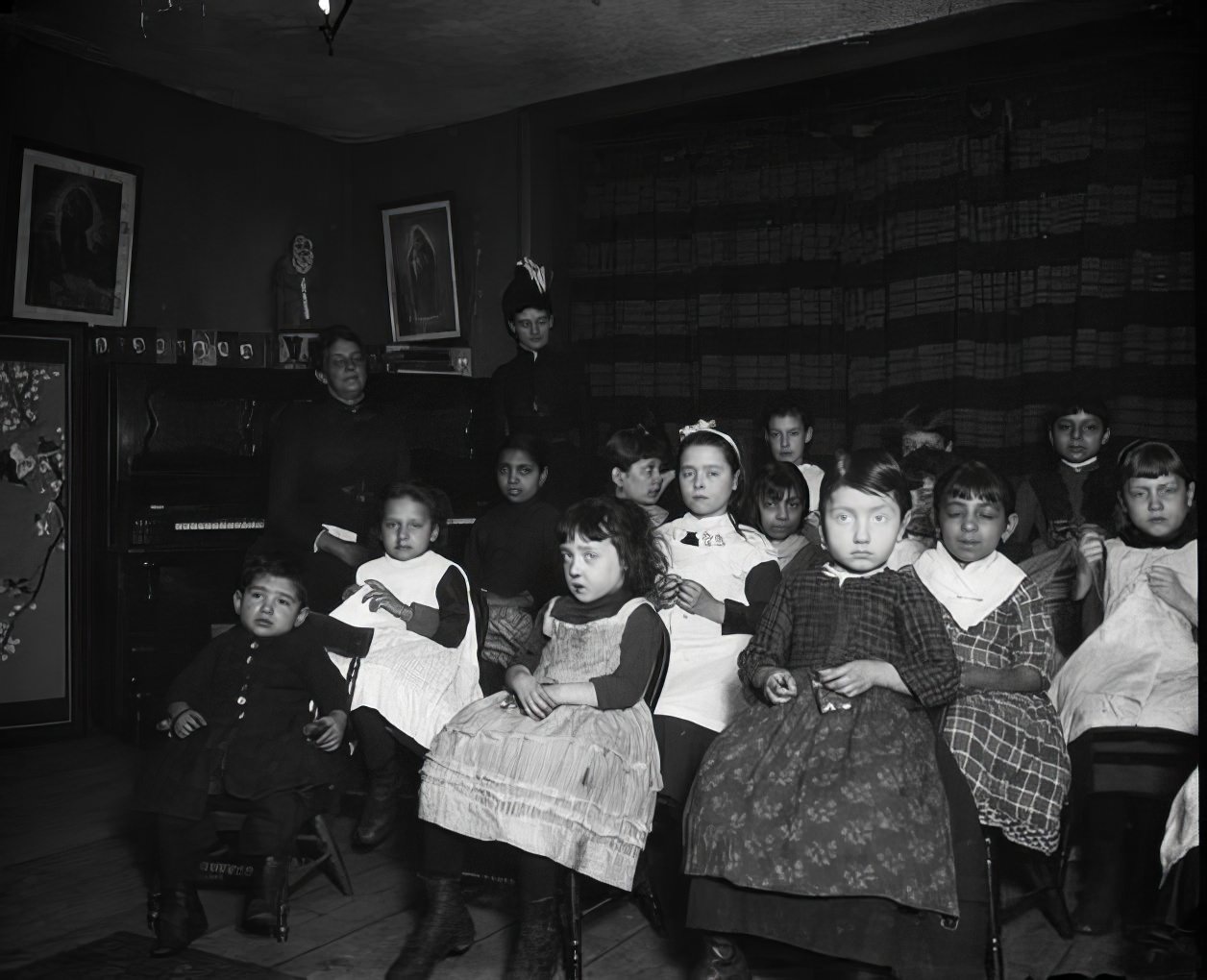 Children in Gotham Court sewing school, 1891.