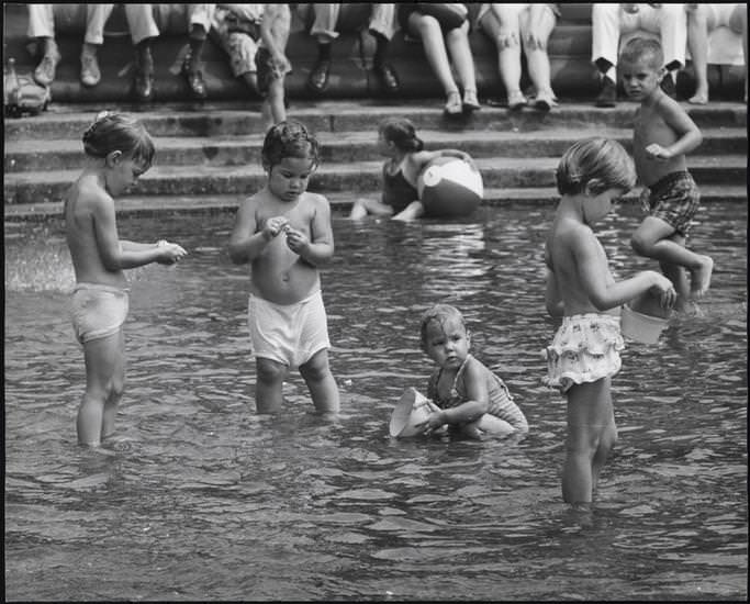 Six children in the fountain pool, Washington Square Park, 1956.