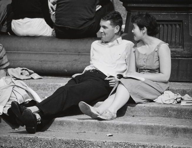 A man and a woman on the fountain steps, Washington Square Park, 1956.