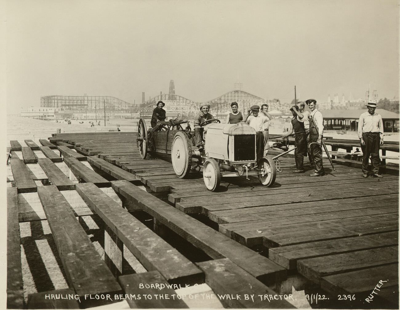 Hauling Floor Beams to the Top of the Walk by Tractor, 1922