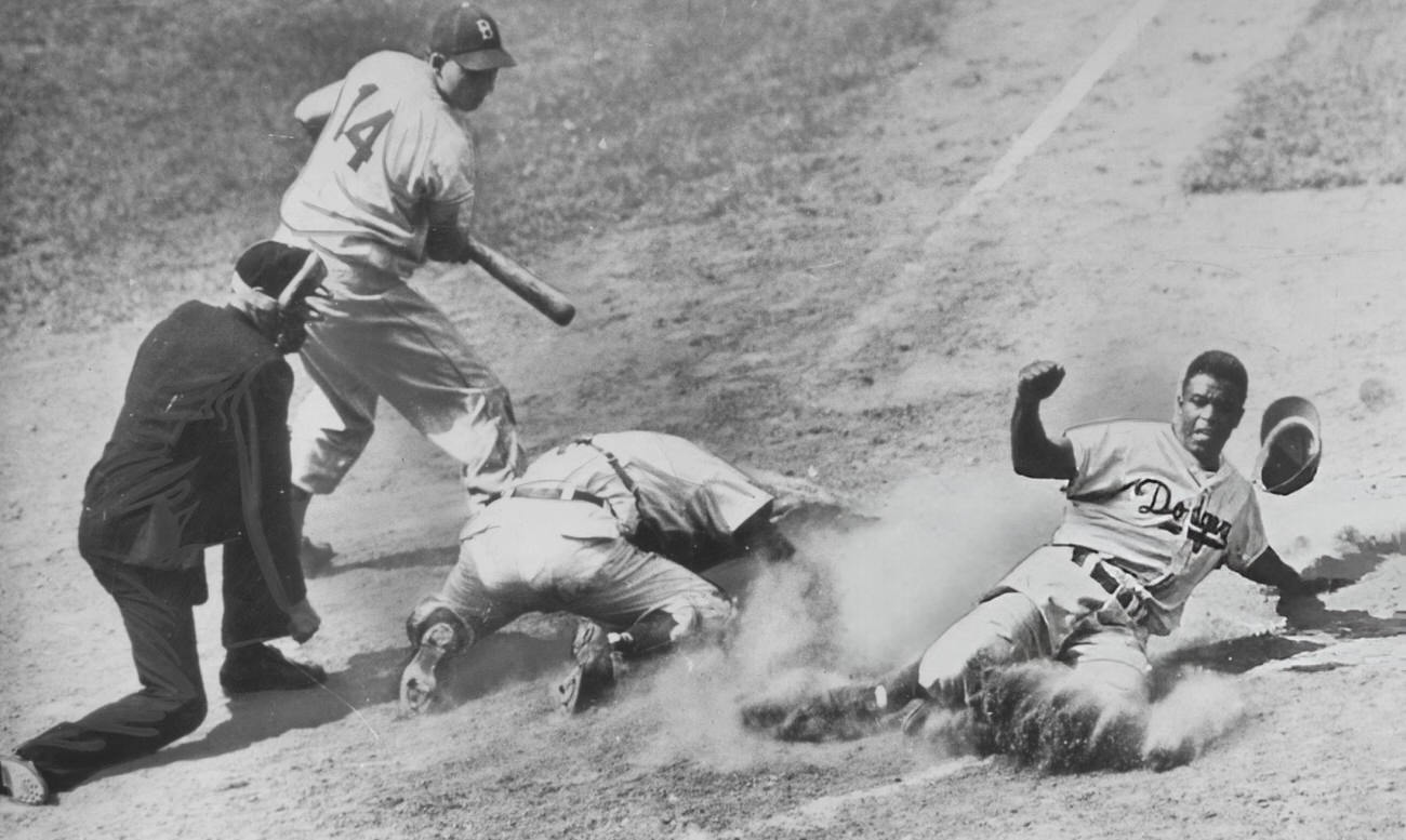 Jackie Robinson sliding home, 1948.