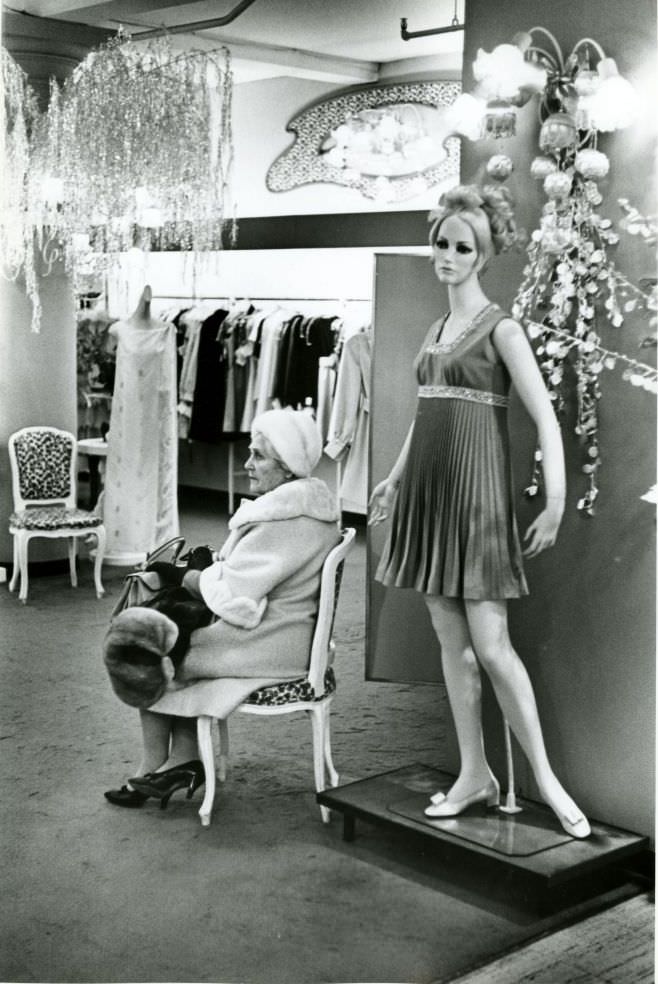 Woman sitting in store.