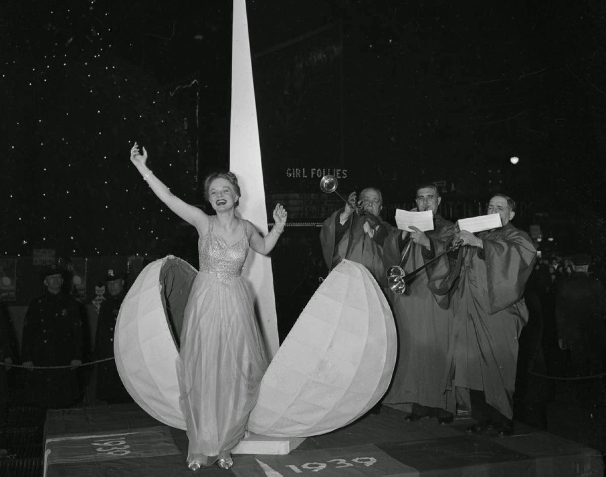 A woman emerging from an egg on New Year's Eve, 1939.