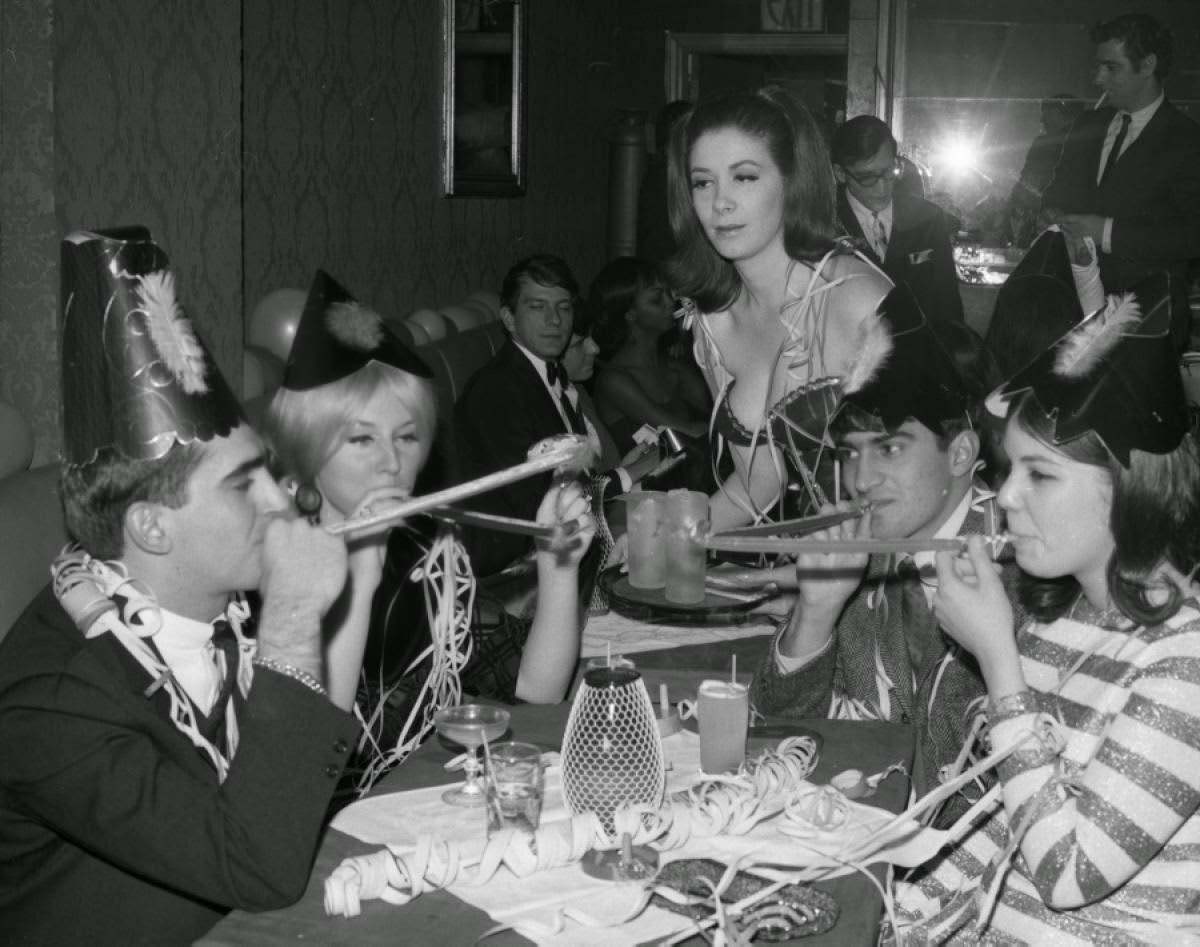 Revelers celebrating New Year's Eve, 1967.