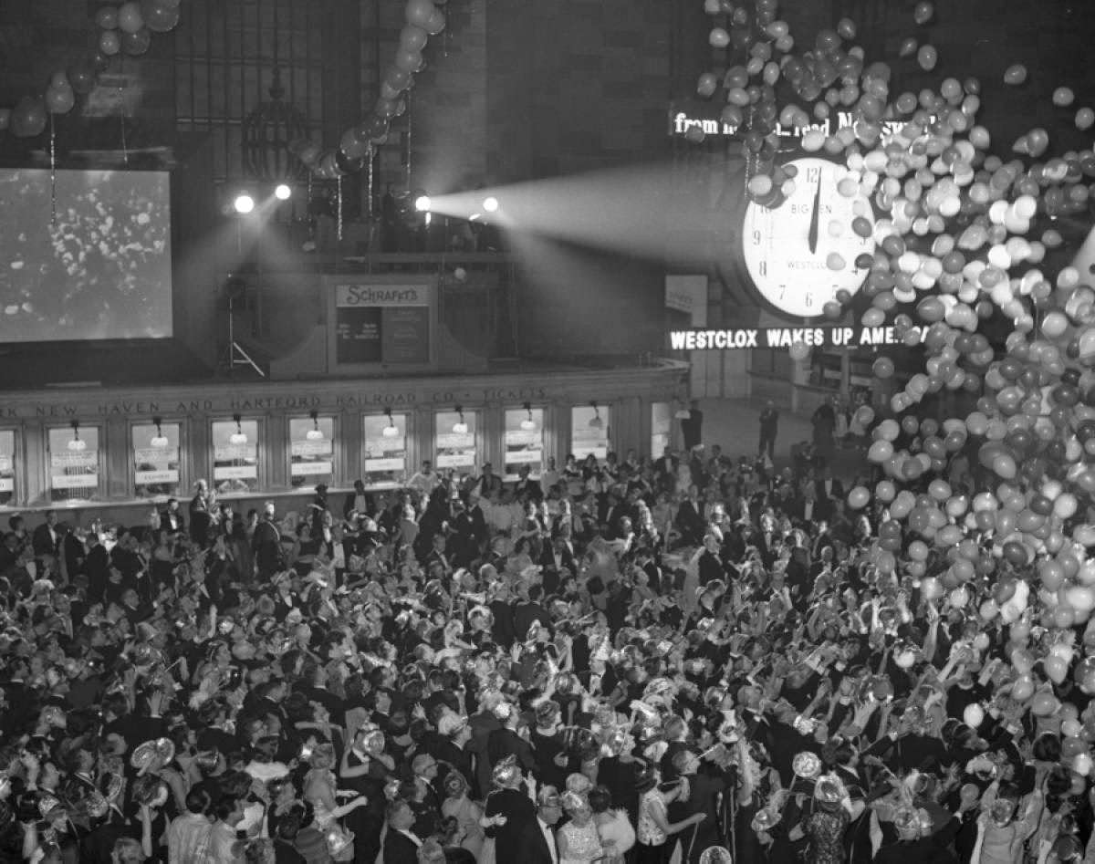 Revelers celebrating New Year's Eve at Grand Central Station, 1963.