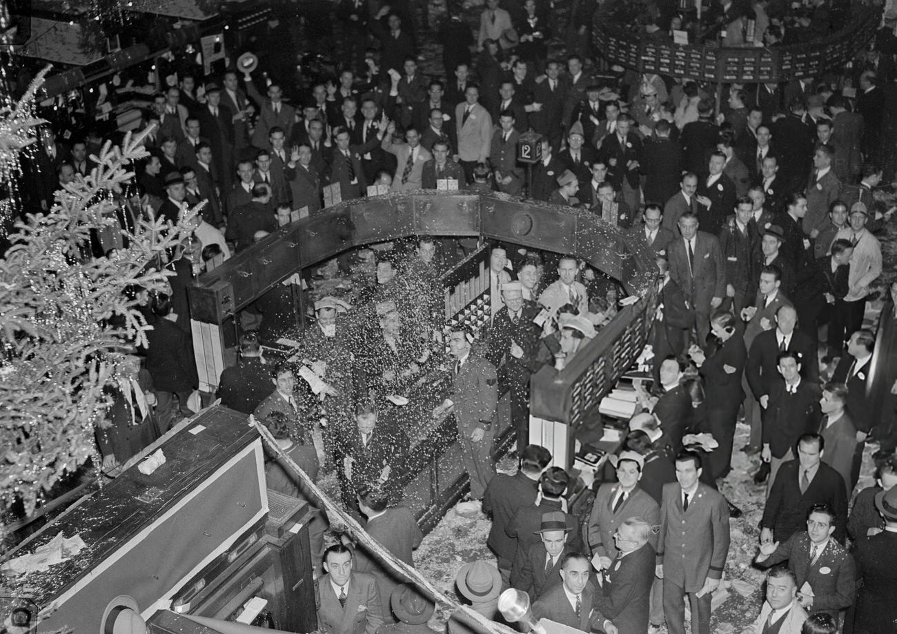 The New York Stock Exchange floor during its annual New Year's party, 1930s.