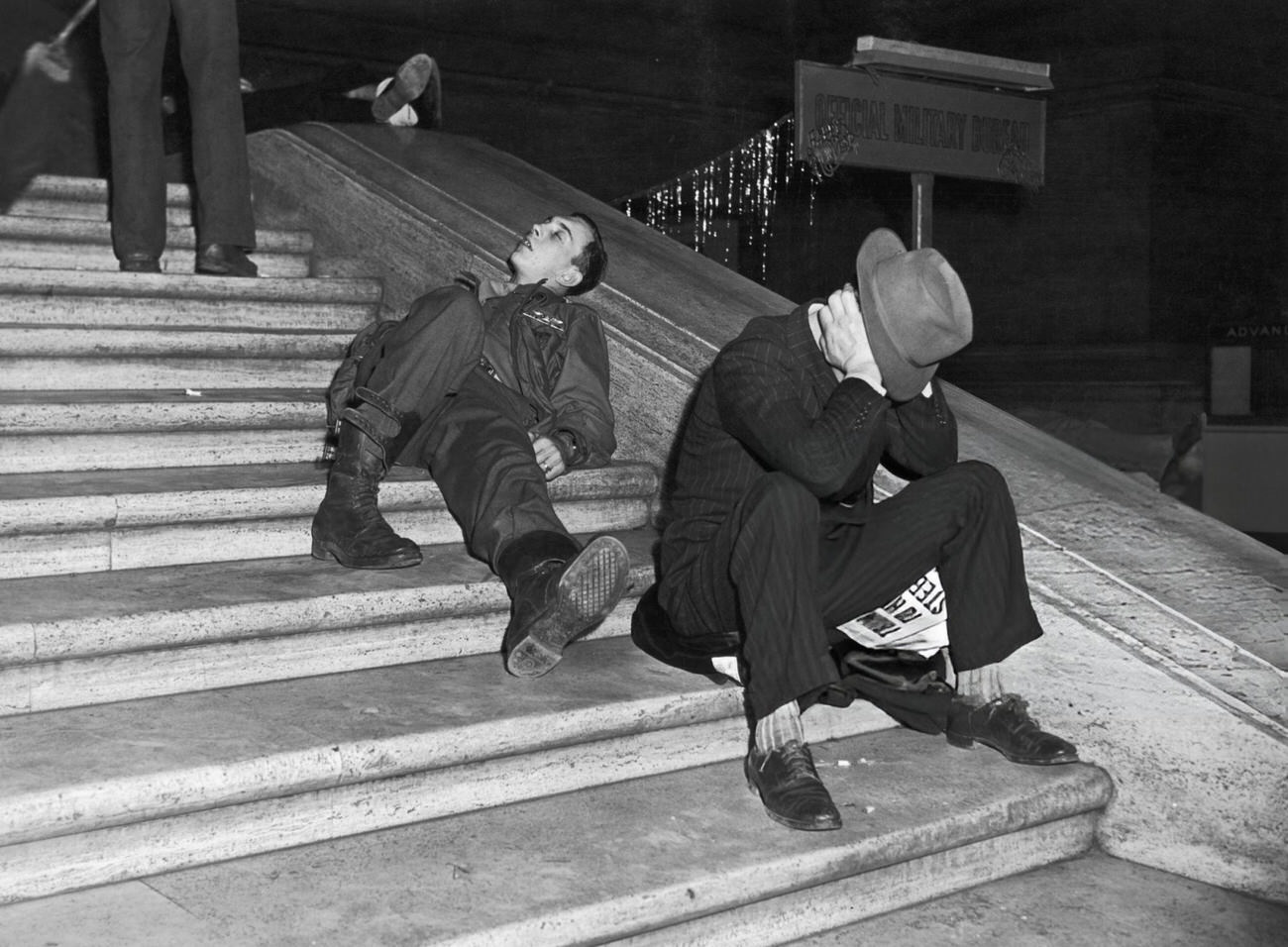 New Year's Eve revelers recovering at Grand Central Station, New York City, 1940.