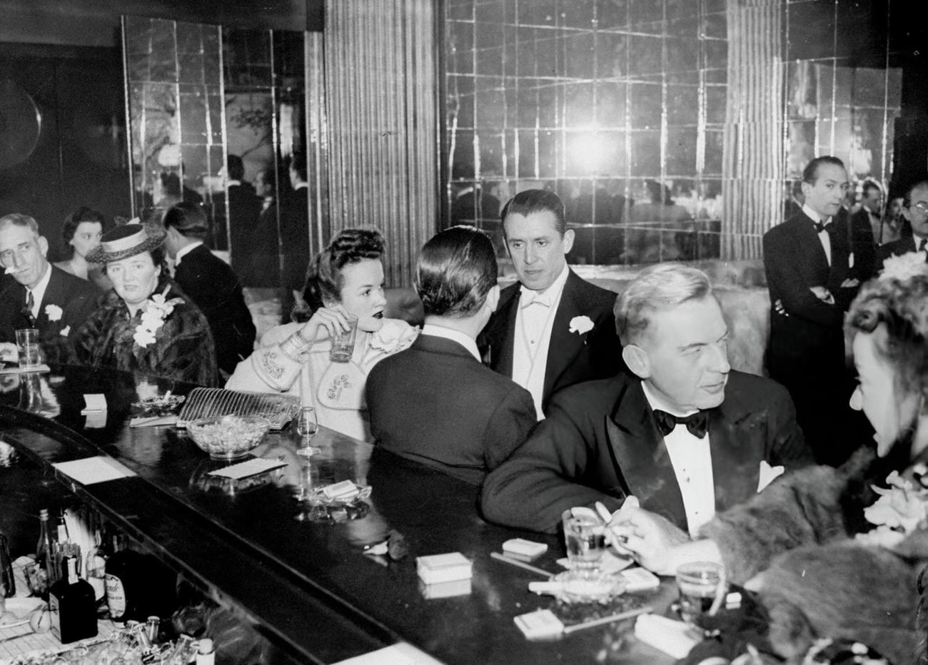 High-class socialites celebrating New Year's Eve at Fefe's Monte Carlo, New York City, 1930s.