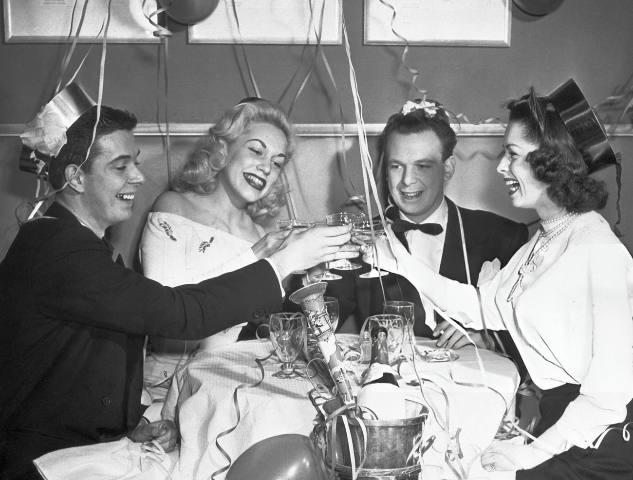 The cast of "Small Wonder" toasting the New Year, New York City, 1948.