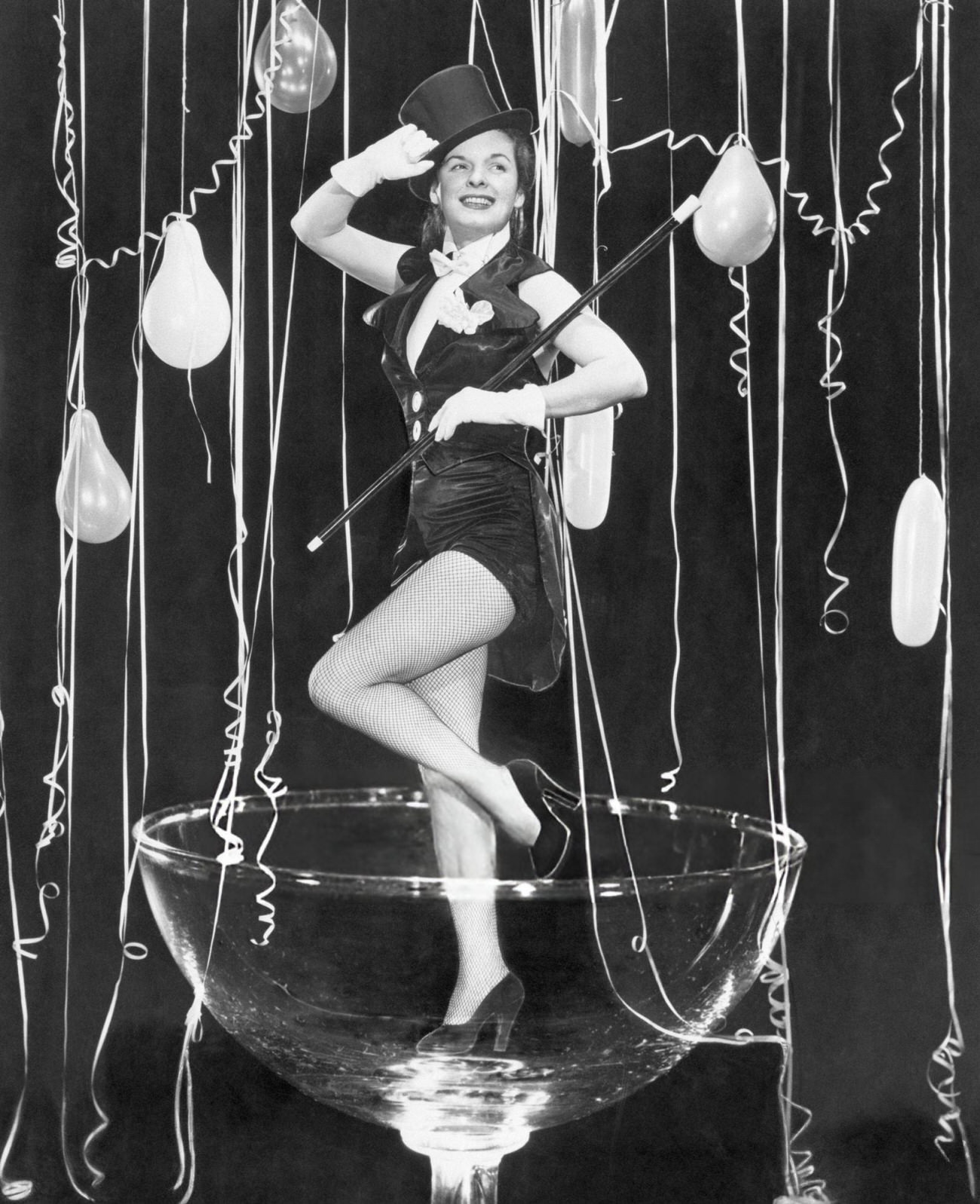 Mercedes McCambridge preparing to welcome 1950, New York City, 1949.