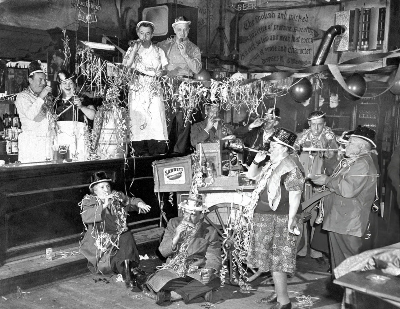 A group celebrating New Year's Eve at Sammy's Bowery Follies, New York City, 1950s.