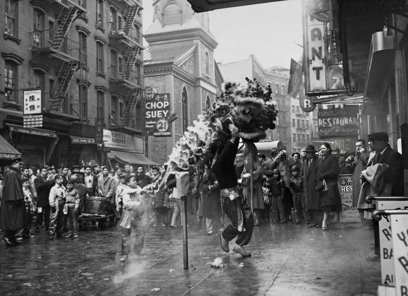 Dragon dance during Chinese New Year celebrations in Chinatown, New York City, 1957.