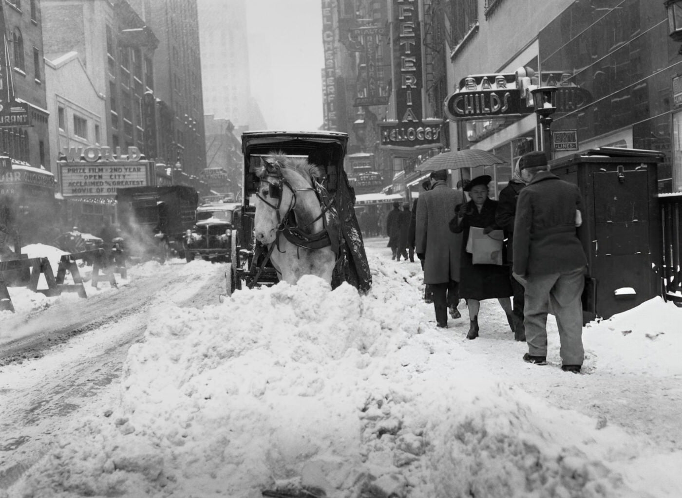 Horse-drawn carriage in the snow at 47th Street and 7th Avenue in New York City, 1947.