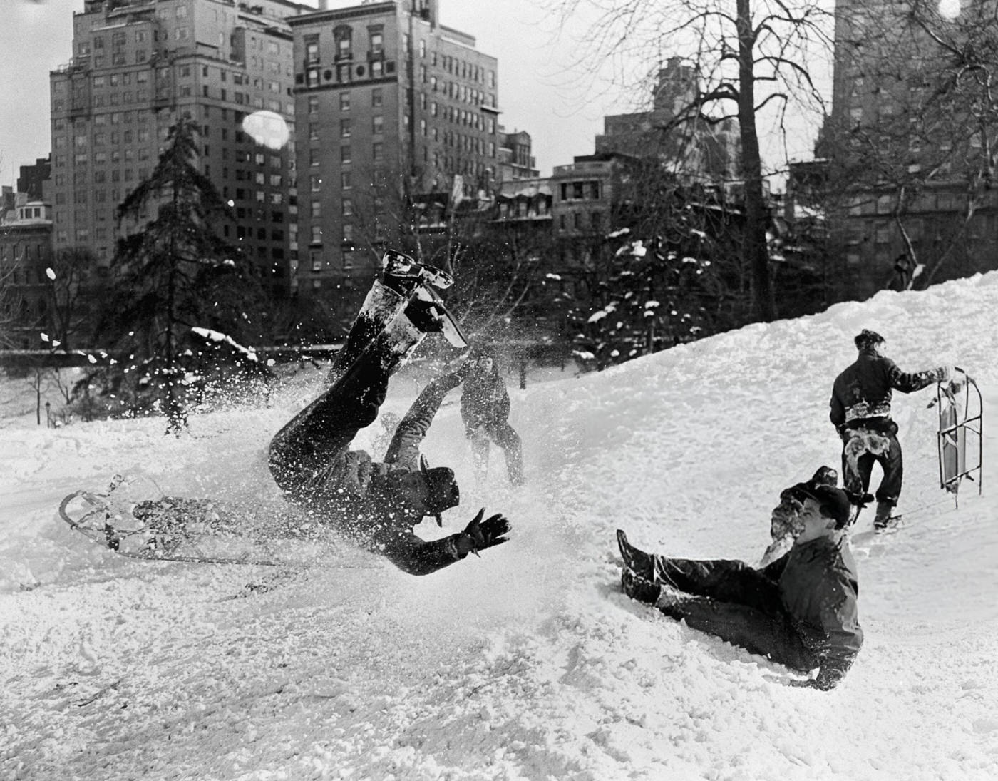 People enjoying the snow in Central Park, New York City, 1947.