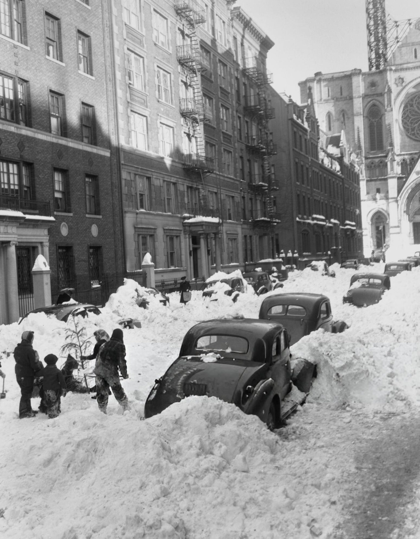 People clearing snow following a snowstorm in New York City during the Great Blizzard of 1947, 1947.