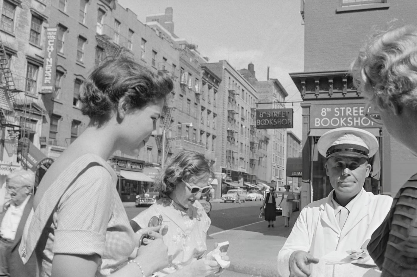 Women buying ice creams outside the Eighth Street Bookshop in Greenwich Village, 1954.