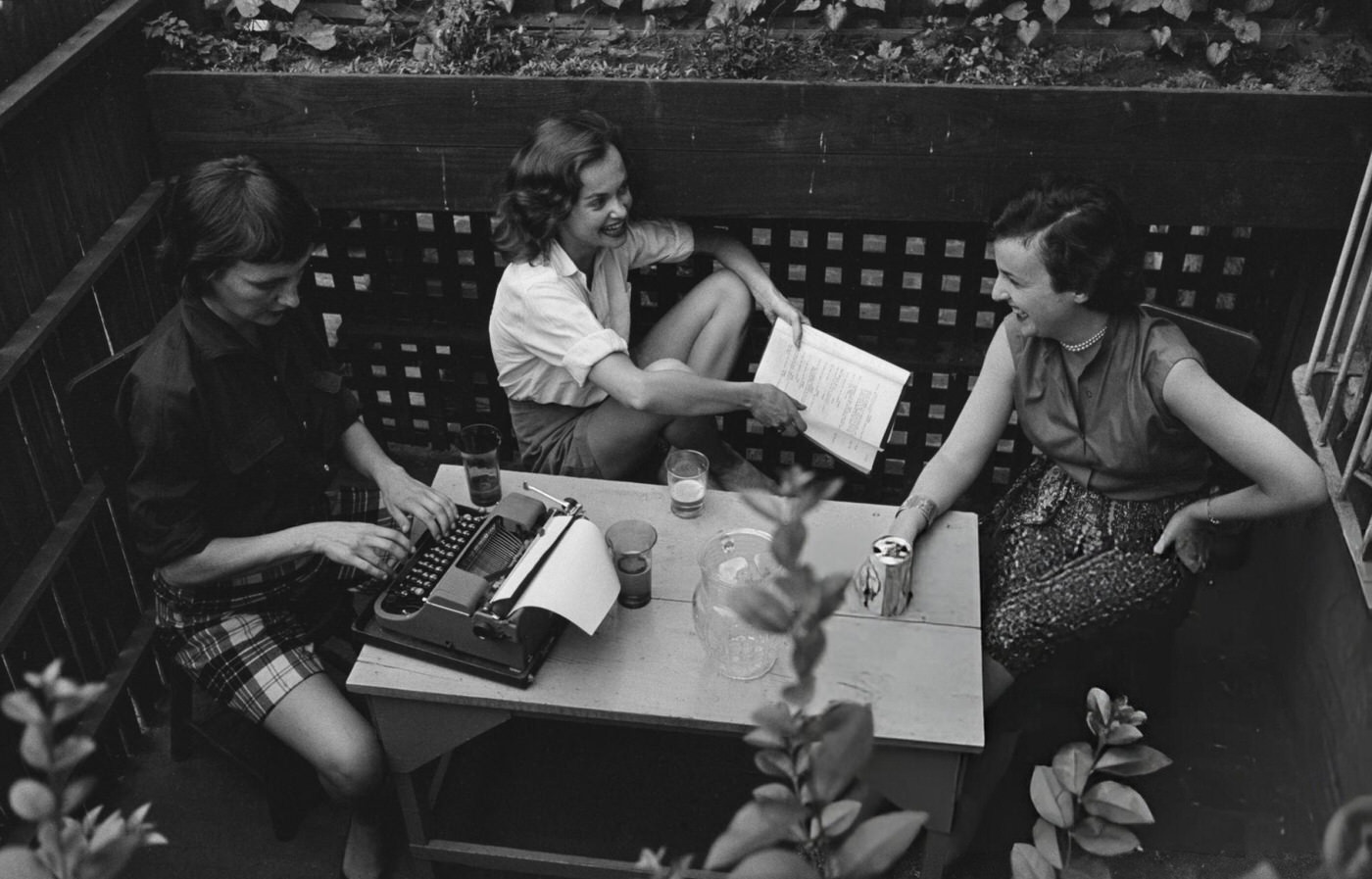 A group of young women working on a script in Greenwich Village, 1954.