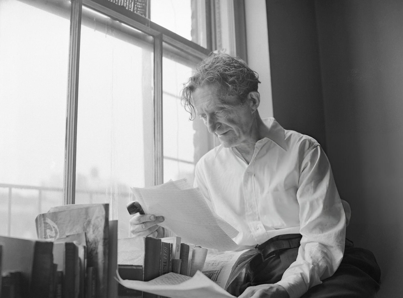 Poet and novelist Max Bodenheim in his Greenwich Village boarding house room.